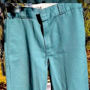 Dickies tealish aqua ish blueish color. Beautiful fabric and color. Real unique